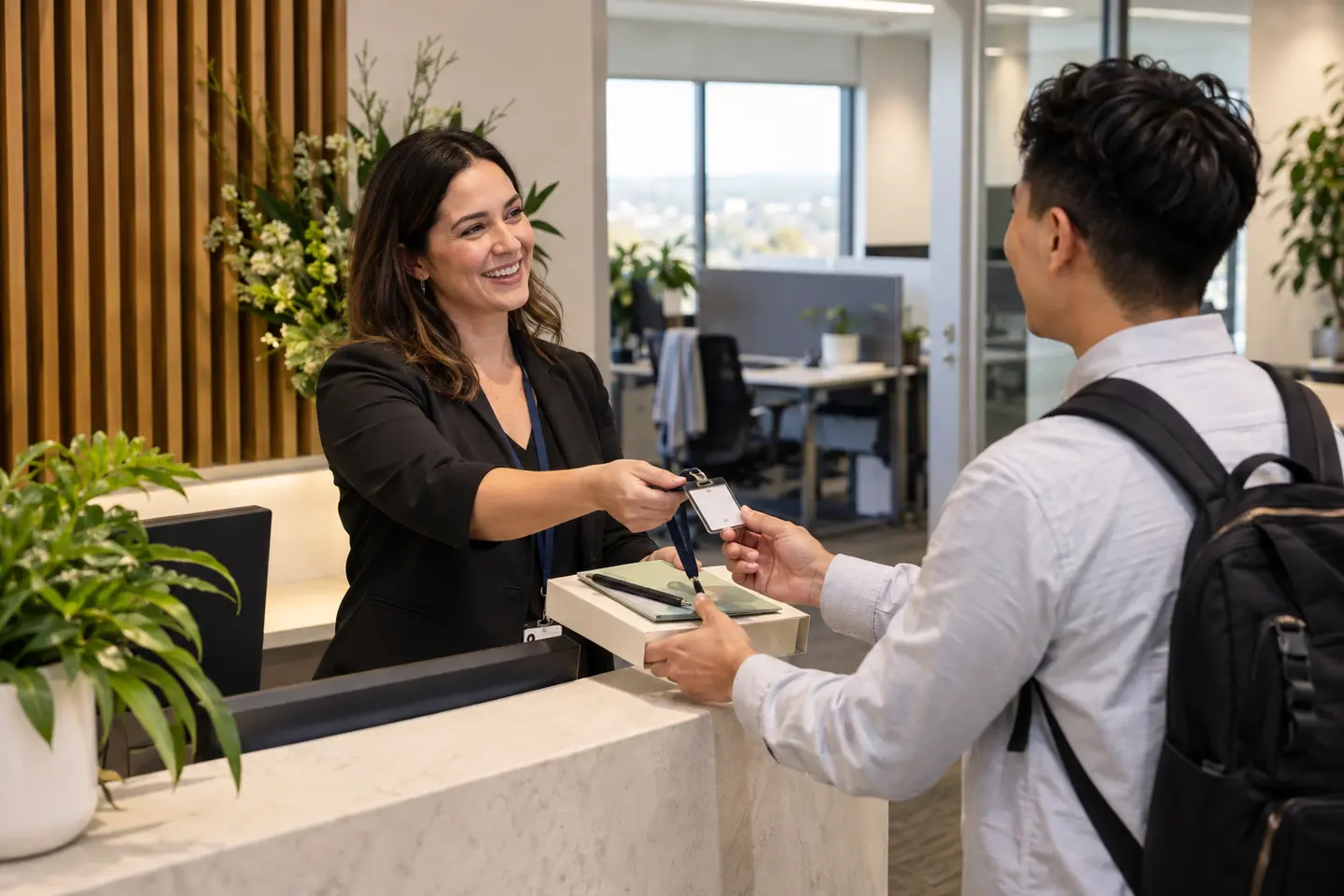 An office employee accessing timesheets, onboarding, leave and policy systems